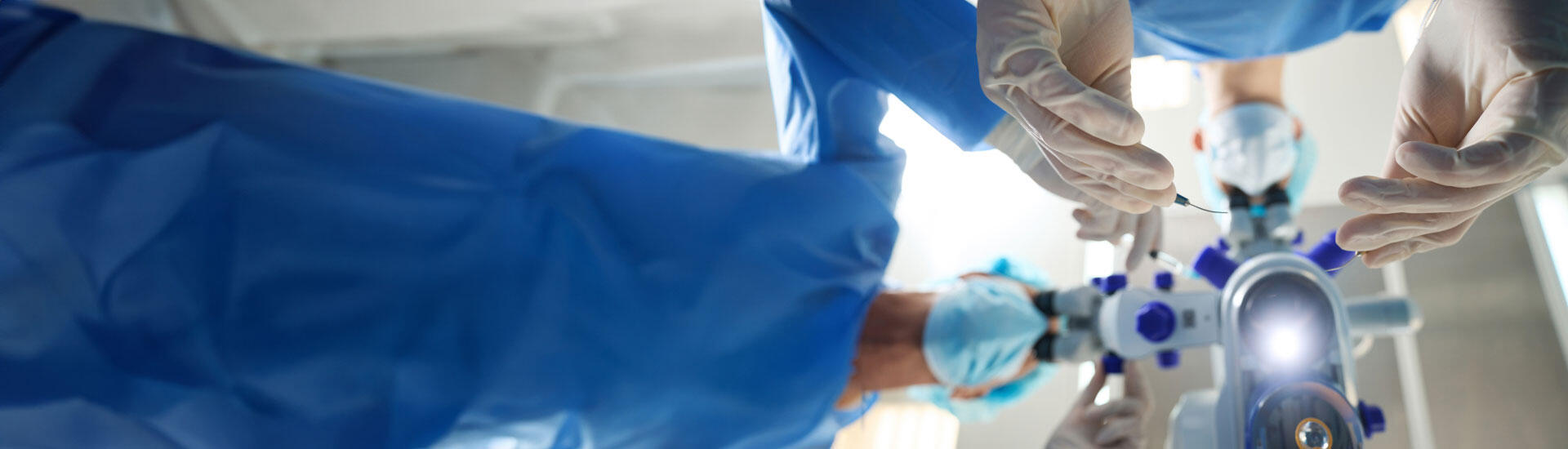 Bottom-to-top view of urologist performing a robotic neobladder surgery.